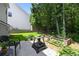 Spacious backyard featuring a patio with a firepit at 167 Diamond Ridge Ave, Canton, GA 30114