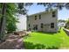 Spacious backyard featuring a well manicured lawn and garden beds at 167 Diamond Ridge Ave, Canton, GA 30114