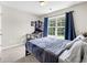 Carpeted bedroom with a bed and desk at 167 Diamond Ridge Ave, Canton, GA 30114