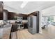 Modern kitchen featuring stainless steel appliances, ample cabinet space, and a functional layout at 167 Diamond Ridge Ave, Canton, GA 30114