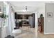 Bright kitchen featuring dark cabinets, stainless steel appliances, and a light toned wood floor at 167 Diamond Ridge Ave, Canton, GA 30114