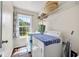 Laundry room includes a window, washer, and dryer at 167 Diamond Ridge Ave, Canton, GA 30114