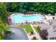 Relaxing community pool area with lounge chairs and umbrellas, perfect for summer days at 167 Diamond Ridge Ave, Canton, GA 30114