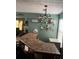 Stylish bar area featuring a tiled countertop with shelving for glassware and drinks at 1793 Cutters Mill Way, Lithonia, GA 30058