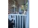 Inviting front porch with white railings and natural light, perfect for relaxing outdoors at 1793 Cutters Mill Way, Lithonia, GA 30058