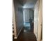 Hallway with hardwood floors leading to a living area at 1793 Cutters Mill Way, Lithonia, GA 30058