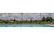 Community pool with lounge chairs, and a lush green landscape at 2159 Redfern Rd, Dacula, GA 30019