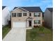 Charming two-story brick home with a well-maintained lawn and a two-car garage in a Gathering-friendly neighborhood at 2159 Redfern Rd, Dacula, GA 30019