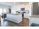 Bright kitchen featuring white cabinets, stainless steel appliances, and a granite island at 2159 Redfern Rd, Dacula, GA 30019