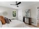 Cozy bedroom with neutral decor, modern art and furnishings, and plenty of natural light at 6456 Wright Ne Rd, Atlanta, GA 30328