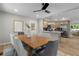 Open concept dining area, with stainless steel appliances in the kitchen and access to backyard at 6456 Wright Ne Rd, Atlanta, GA 30328