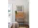Stylish living room featuring a decorative cabinet with natural accents and a bohemian-style aesthetic at 6456 Wright Ne Rd, Atlanta, GA 30328