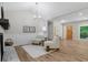 Open-concept living area featuring fireplace, and lots of natural light at 6456 Wright Ne Rd, Atlanta, GA 30328