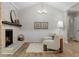 Cozy sitting area with a painted brick fireplace and stylish decor at 6456 Wright Ne Rd, Atlanta, GA 30328