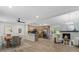 Open-concept living space with kitchen, dining area, and fireplace; perfect for entertaining at 6456 Wright Ne Rd, Atlanta, GA 30328