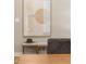 Sitting area with geometric art, striped benches and a neutral color palette at 6456 Wright Ne Rd, Atlanta, GA 30328