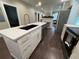 Bright kitchen featuring quartz countertops, stainless steel appliances, and ample storage at 2148 Martin Luther King Jr Sw Dr, Atlanta, GA 30310