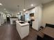 Modern kitchen with white cabinets, stainless steel appliances, and a center island at 2148 Martin Luther King Jr Sw Dr, Atlanta, GA 30310