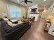 Spacious living room with a fireplace, hardwood floors, and ample natural light at 2148 Martin Luther King Jr Sw Dr, Atlanta, GA 30310
