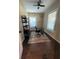 Bright office features a ceiling fan, natural light, modern desk and shelving for a functional workspace at 2148 Martin Luther King Jr Sw Dr, Atlanta, GA 30310