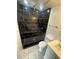 Bathroom featuring a tiled walk-in shower, toilet and vanity sink at 4356 Rockbridge Rd, Stone Mountain, GA 30083