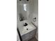 Updated half bath with new vanity, fixtures, and stylish mirror at 4356 Rockbridge Rd, Stone Mountain, GA 30083