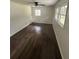 Bright bedroom featuring gorgeous hardwood floors and great natural light from the multiple windows at 4356 Rockbridge Rd, Stone Mountain, GA 30083