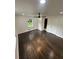 Spacious bedroom with wood floors, natural light, and closet at 4356 Rockbridge Rd, Stone Mountain, GA 30083