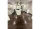 Modern kitchen with sleek white cabinets, stainless steel appliances, and granite countertops at 4356 Rockbridge Rd, Stone Mountain, GA 30083