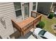 Second story deck with wood railing in backyard at 4458 Dunblane Ave, Sugar Hill, GA 30518
