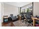 Office with modern furniture, multiple monitors, and large windows at 4458 Dunblane Ave, Sugar Hill, GA 30518