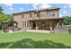 A spacious patio with outdoor kitchen and hot tub make this an entertainer's dream at 4547 Meadow Green Nw Ln, Acworth, GA 30101
