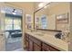 Bathroom features a granite countertop vanity and access to a bedroom at 4547 Meadow Green Nw Ln, Acworth, GA 30101
