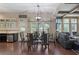 Bright dining area with large windows, comfortable seating, and an open-concept layout at 4547 Meadow Green Nw Ln, Acworth, GA 30101