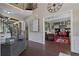 Bright foyer with hardwood flooring and staircase leading to a second-floor landing at 4547 Meadow Green Nw Ln, Acworth, GA 30101