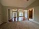 Spacious living area with hardwood floors, coffered ceilings, and decorative columns at 237 Shockley Way, Dallas, GA 30157