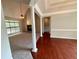 Open living space with hardwood floors, a fireplace, and large windows for ample natural light at 237 Shockley Way, Dallas, GA 30157