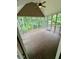 View of the screened-in back porch with wooded scenery at 237 Shockley Way, Dallas, GA 30157
