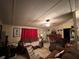 Cozy living room with comfortable seating, ceiling fan, and natural light, ideal for relaxing and entertaining at 25 Dogwood Dr Nw, Cartersville, GA 30121