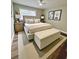 Well-lit bedroom featuring a bed with bench, stylish decor, and ample natural light at 405 Fairburn Sw Rd # 231, Atlanta, GA 30331
