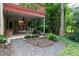 Backyard patio and outdoor living space is enhanced by lush landscaping at 5287 Wild Indigo Way, Acworth, GA 30102