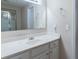 Bathroom featuring a white vanity, framed mirror, and a shower and toilet in the background at 5287 Wild Indigo Way, Acworth, GA 30102