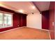 Large carpeted bonus room with a large window and a feature wall at 5287 Wild Indigo Way, Acworth, GA 30102