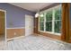 Cozy breakfast nook featuring tile flooring and large windows offering scenic views at 5287 Wild Indigo Way, Acworth, GA 30102