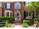 Attractive brick home exterior with manicured landscaping and inviting front entrance at 5287 Wild Indigo Way, Acworth, GA 30102
