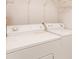 Convenient laundry room featuring a full-size washer and dryer for easy chore completion at 5287 Wild Indigo Way, Acworth, GA 30102