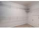 Spacious walk-in closet featuring wire shelving to keep your wardrobe organized and accessible at 5287 Wild Indigo Way, Acworth, GA 30102