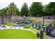 Beautiful landscaped backyard with rock garden, small pond, and bridge at 552 Warrenton Run Dr, Sugar Hill, GA 30518
