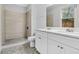 Bathroom boasts a dual vanity, modern finishes, and a walk-in shower at 1283 Mercer, East Point, GA 30344