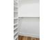 Spacious walk-in closet with built-in shelving for optimal organization at 1283 Mercer, East Point, GA 30344